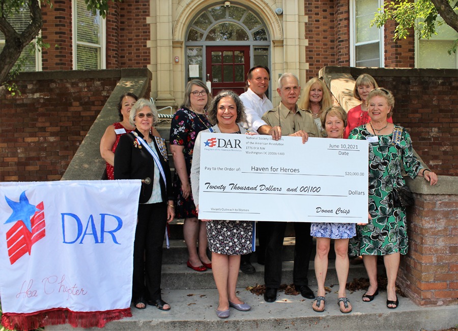 Presenting funds to Haven for Heroes